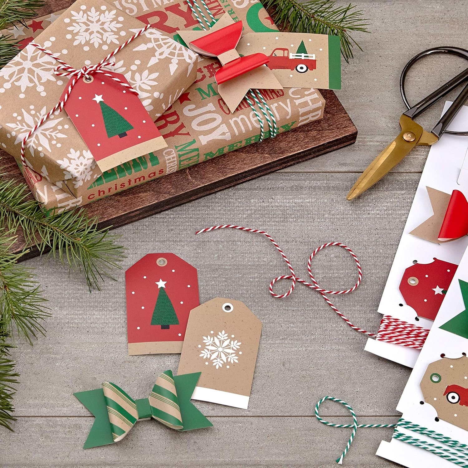 image:imageHallmark Holiday Gift Wrap Accessory Kit Red Truck Tree Snowflake 6 Gift Bows 12 Gift Tags 9 Yards of Twine  Kraft Red Green WhiteRed  Green  and Kraft