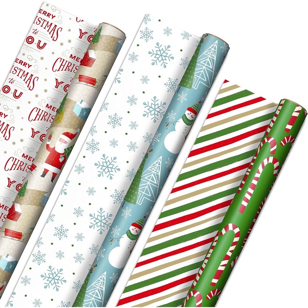 image:imageHallmark Reversible Christmas Wrapping Paper 3 Rolls 120 sq ft ttl Rustic Santa Papercraft Snowmen Candy Canes Stripes Snowflakes Merry Christmas to YouRustic Santa  Papercraft Snowmen  Candy Canes  Stripes  Snowflakes  Merry Christmas to You
