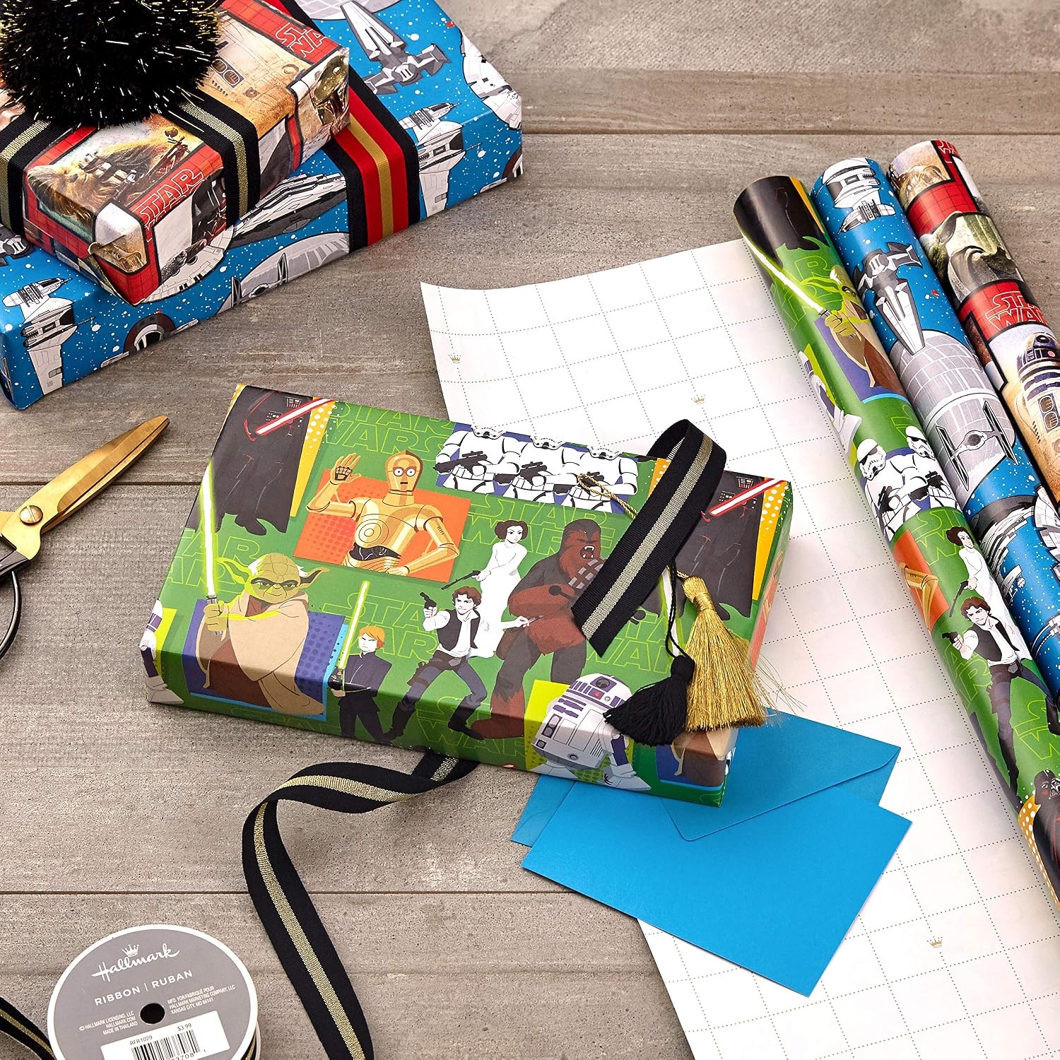image:imageHallmark Star Wars Wrapping Paper with Cut Lines on Reverse 3Pack 60 sq ft ttl with Yoda Darth Vader Chewbacca R2D2 C3PO Stormtroopers XWing Millennium FalconWrapping Paper